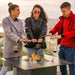 engasco slava low gas fire table hospitality guests gathered round table view