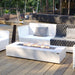 mezzo gas fire pit in white lifestyle image