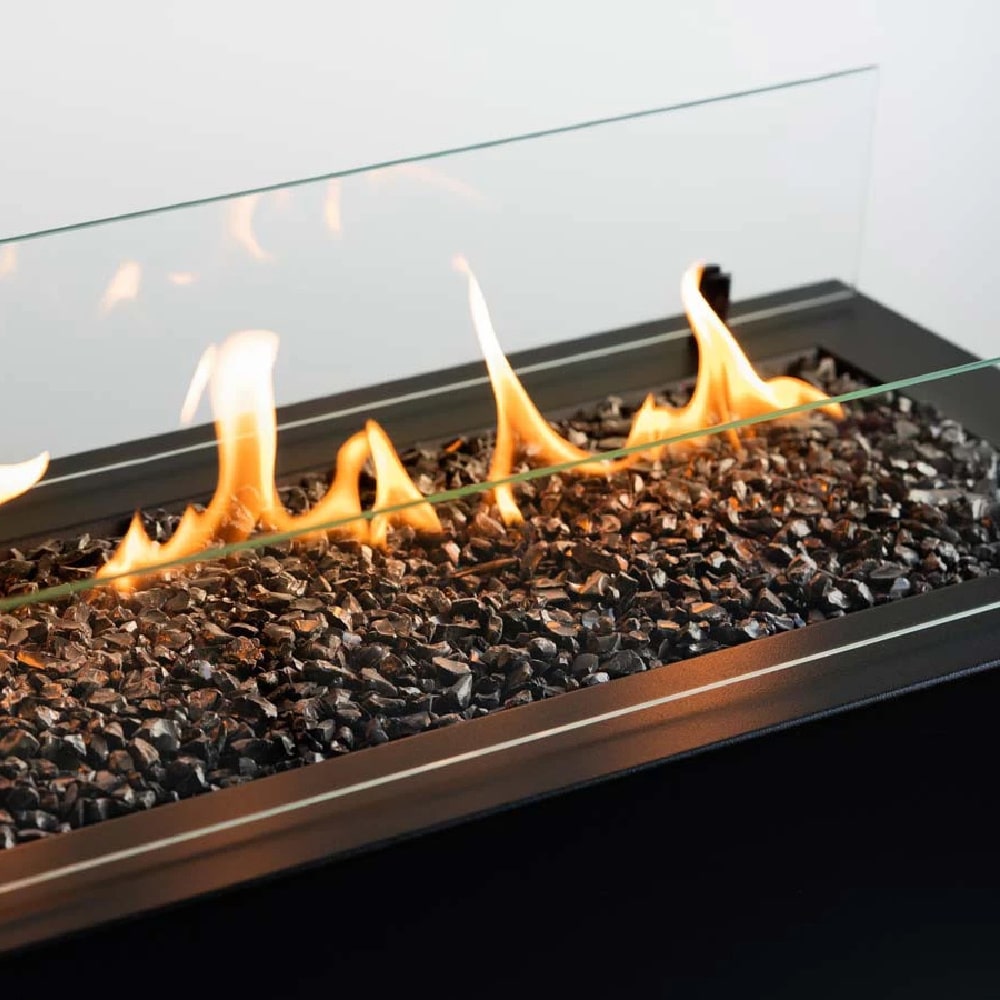 planika rio outdoor fireplace close up flame and rock view