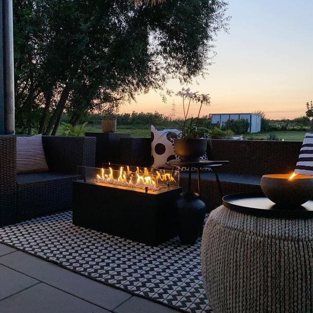 planika rio outdoor fireplace cosy setting view