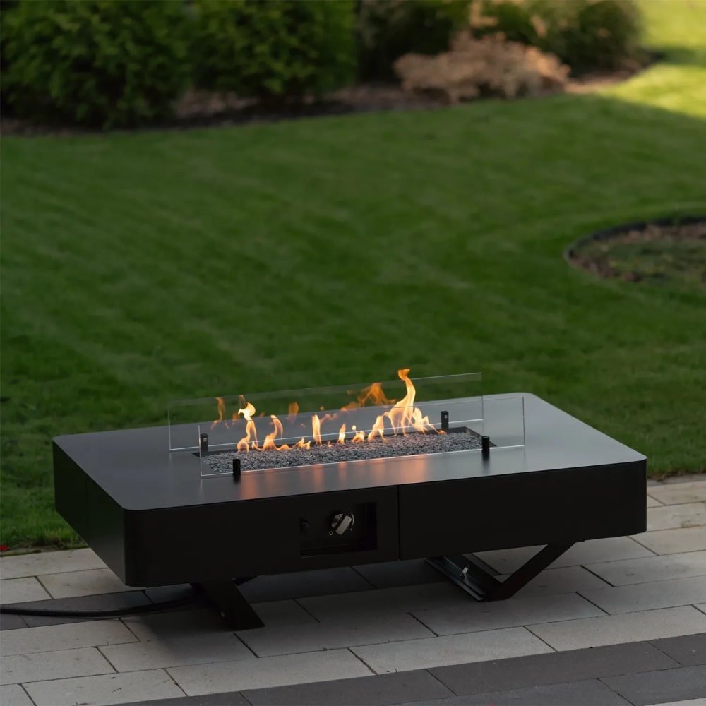 planika rio table outdoor gas fireplace on tile outside garden view