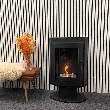 scandiflames trenton freestanding bioethanol stove next to seat view