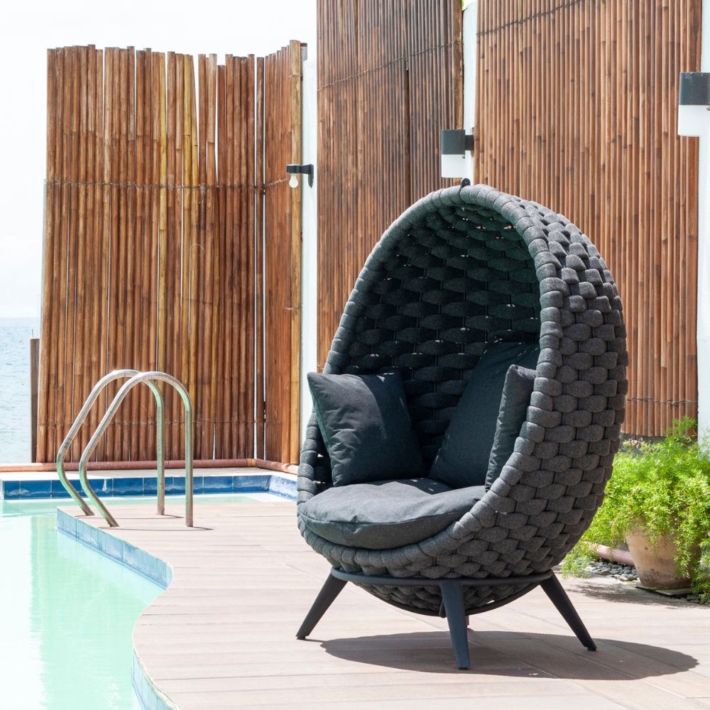 alexander rose cordial luxe lucy hanging chair with base dark grey by pool view