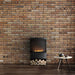 planika senso freestanding bioethanol stove brick wall view